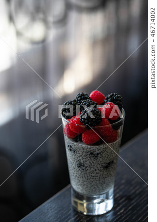 chia seed pudding with berries, healthy dessert 46714002
