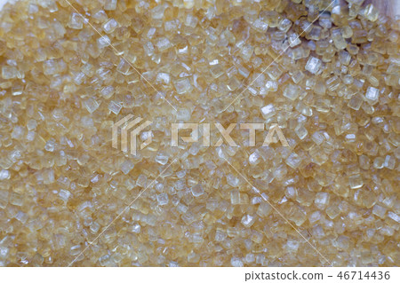Crystals of Sugar.Brown cane sugar on white. 46714436