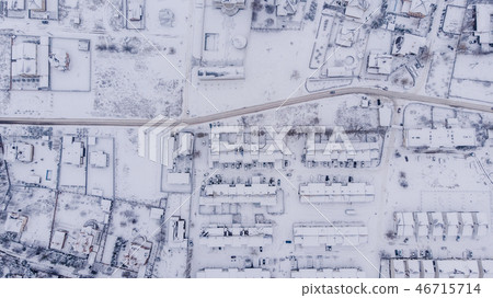 Aerial view on winter town. Many houses Aerial view on winter town. Many houses 46715714