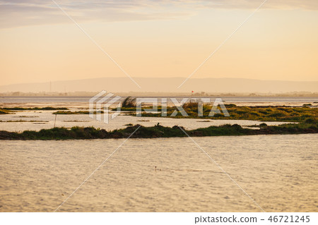 Sunset over wetland. Sunset over wetland. 46721245