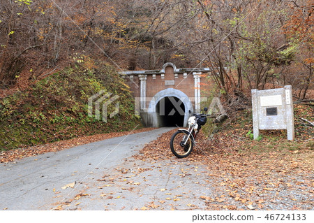 Motorbike and tunnel in autumn Shishigu old road former side Tokyo side 46724133