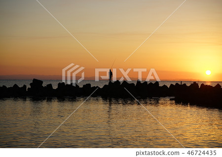 Sunrise and angler 46724435