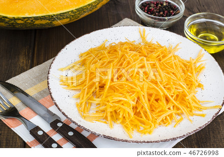 Vegetarian salad of fresh organic pumpkin, raw  46726998