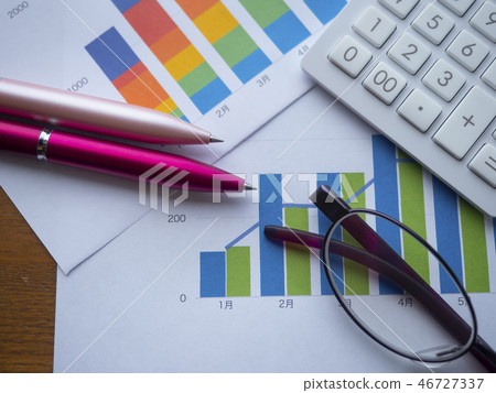 Business image · graph · glasses · calculator · female Business image · graph · glasses · calculator · female 46727337