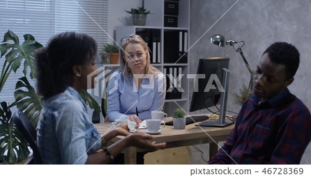 Couple talking in the office of a psychologist 46728369