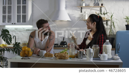 Couple talking during breakfast Couple talking during breakfast 46728605