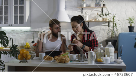 Man and woman talking during breakfast Man and woman talking during breakfast 46728607