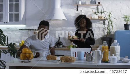 Man and woman talking during breakfast Man and woman talking during breakfast 46728657