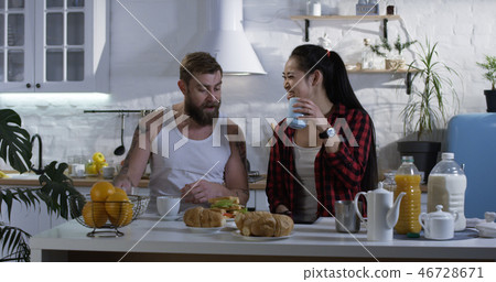 Couple talking during breakfast 46728671