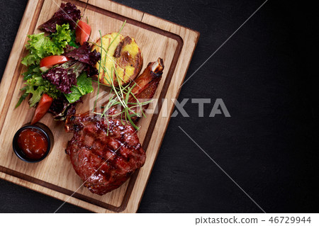 medium rare rib steak, grill and barbeque meat medium rare rib steak, grill and barbeque meat 46729944