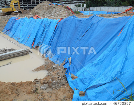 Temporary slope protection use the plastic sheet Temporary slope protection use the plastic sheet 46730897