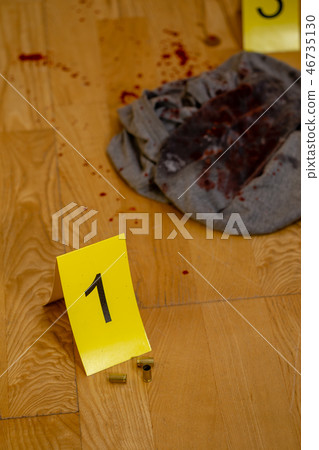 Bullets, bloody clothes and gun at crime scene Bullets, bloody clothes and gun at crime scene 46735130