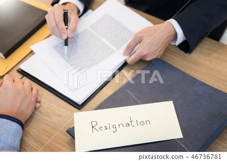 businessman hand sending a resignation letter to executive boss businessman hand sending a resignation letter to executive boss 46736781