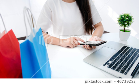 happy young woman using mobile smart phone happy young woman using mobile smart phone 46739252