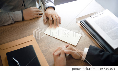 man with resignation letter for quit a job 46739304