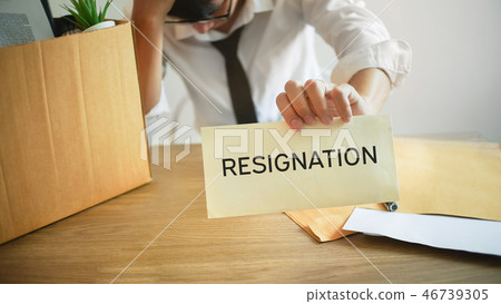 man stressing with resignation letter quit a job 46739305