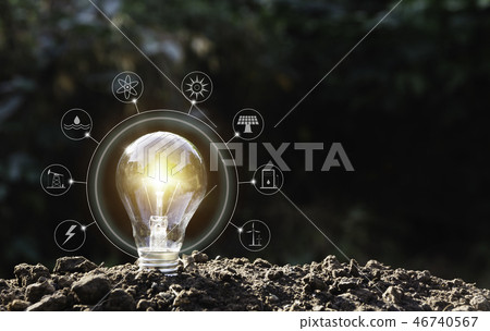 Energy saving light bulb on nature background Energy saving light bulb on nature background 46740567