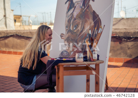 Young woman paint artist drawing at home roof Young woman paint artist drawing at home roof 46742128