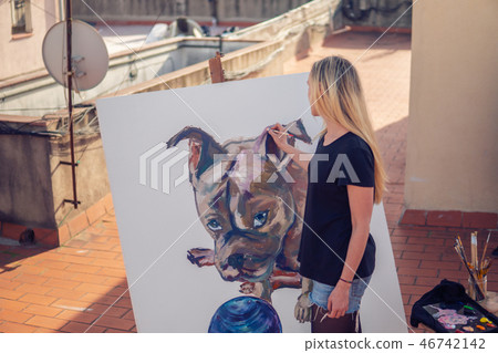 Young woman paint artist drawing at home roof Young woman paint artist drawing at home roof 46742142