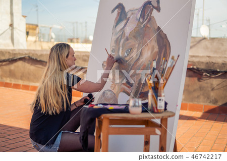 Young woman paint artist drawing at home roof Young woman paint artist drawing at home roof 46742217