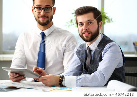 Group of businessmen point finger and silver pen in arms Group of businessmen point finger and silver pen in arms 46742218