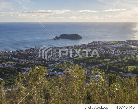 Aerial view of Vila Franca do Campo town with its famous volcanic islet near the coast, from 46746449