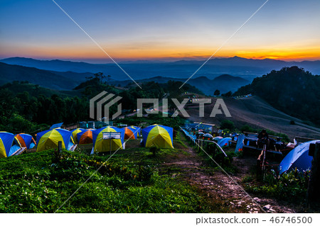 tent in the sunset overlooking mountains tent in the sunset overlooking mountains 46746500