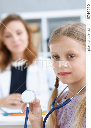 Little child at pediatrician reception Little child at pediatrician reception 46746930