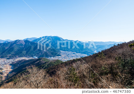 Mountain scenery and townscape seen from Arakurayama Goten (Fujiyoshida City, Yamanashi Prefecture) *Photo taken in December 2016 Mountain scenery and townscape seen from Arakurayama Goten (Fujiyoshida City, Yamanashi Prefecture) *Photo taken in December 2016 46747380