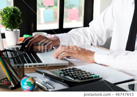 Business man working with financial data Business man working with financial data 46747653