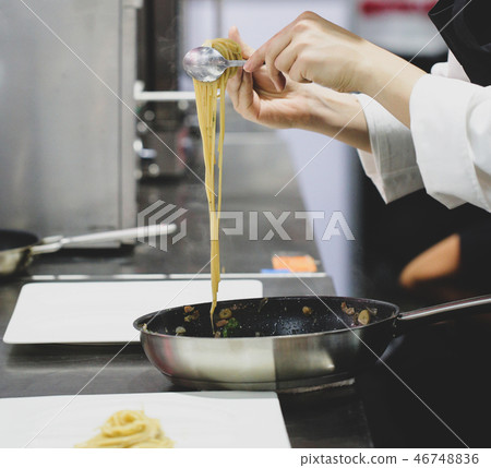 Chef preparing food, meal, in the kitchen Chef preparing food, meal, in the kitchen 46748836