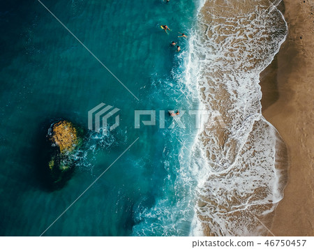Aerial View From Flying Drone Of People Relaxing Aerial View From Flying Drone Of People Relaxing 46750457