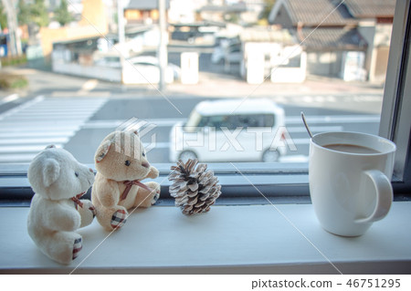 Coffee cup and couple bear sit on wooden bar Coffee cup and couple bear sit on wooden bar 46751295
