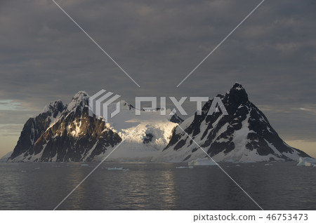 Mountain view from ship at sunset in Antarctica 46753473
