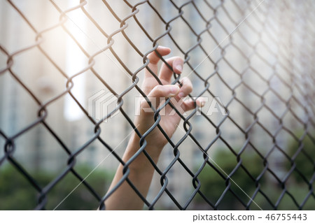Depressed, trouble and solution hand on chain-link 46755443