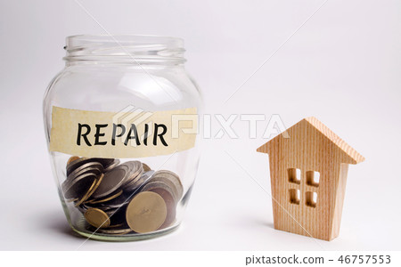 Glass jar with the inscription Repair and a small Glass jar with the inscription Repair and a small 46757553