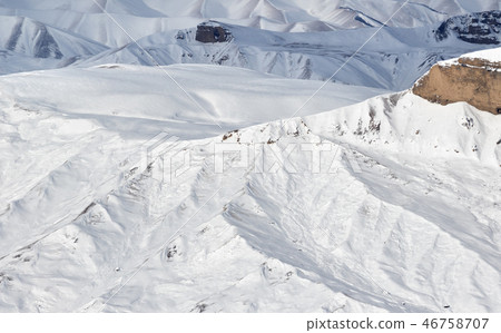 Mountain range in snow at sun winter day 46758707