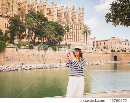 Happy woman with a smartphone 46760275