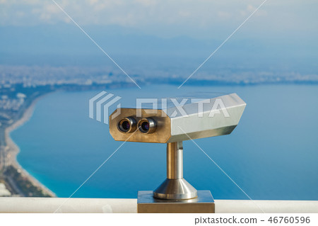 Closeup view of coin operated binocular viewer for looking Closeup view of coin operated binocular viewer for looking 46760596
