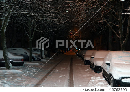 Parked cars covered with snow - snow storm. Parked cars covered with snow - snow storm. 46762793