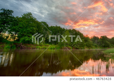 Sunset long the banks of the Amazon river 46763428