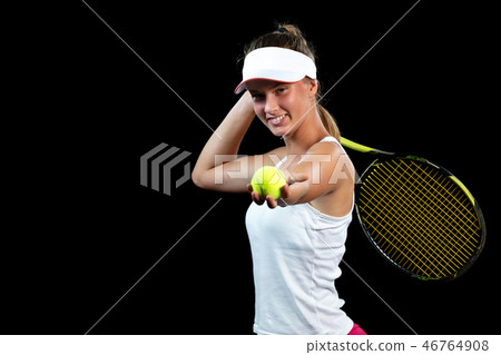 Young woman on a tennis practice. Beginner player holding a racket, learning basic skills. Portrait 46764908