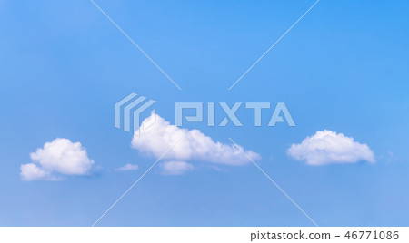 Blue sky with small white clouds. Blue sky with small white clouds. 46771086
