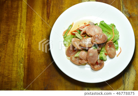 spicy Chinese pork sausage with vegetable salad 46778875