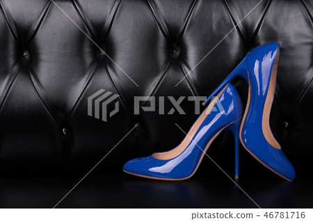 Two blue patent leather shoes. Two blue patent leather shoes. 46781716