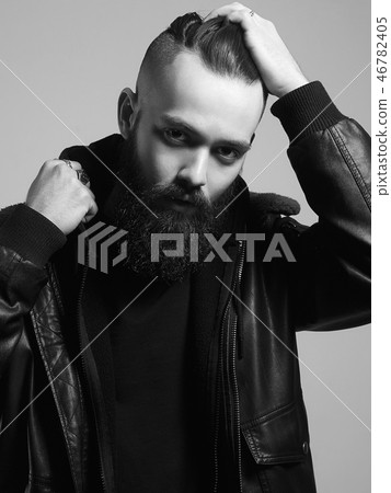 Man with stylish haircut. handsome Boy with beard 46782405