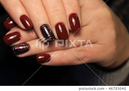 The refined beautiful female fingers with original design manicure 46783048