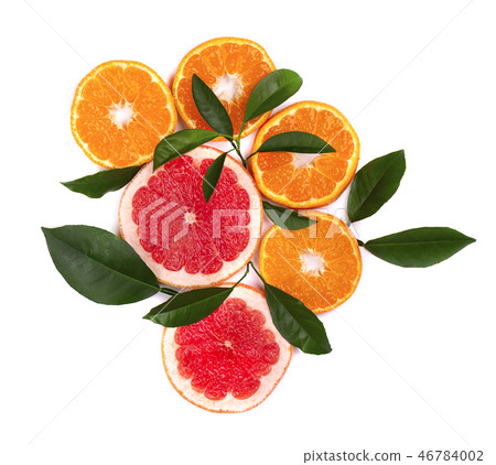 Citrus fruits isolated on white background. Isolated citrus fruits. Pieces of mandarin, pink Citrus fruits isolated on white background. Isolated citrus fruits. Pieces of mandarin, pink 46784002