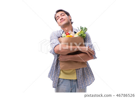 Young man with his grocery shopping on white 46786526