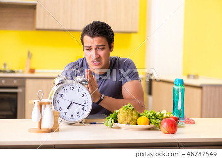 Young man in dieting and healthy eating concept 46787549